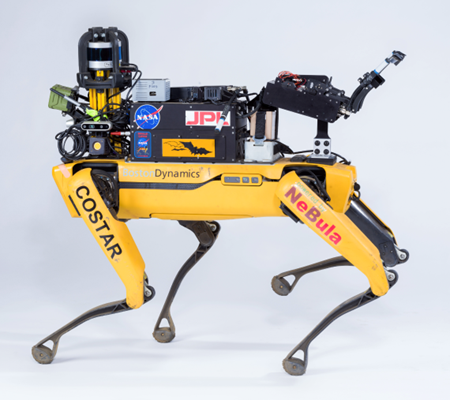 a yellow robot with a body form similar to a dog